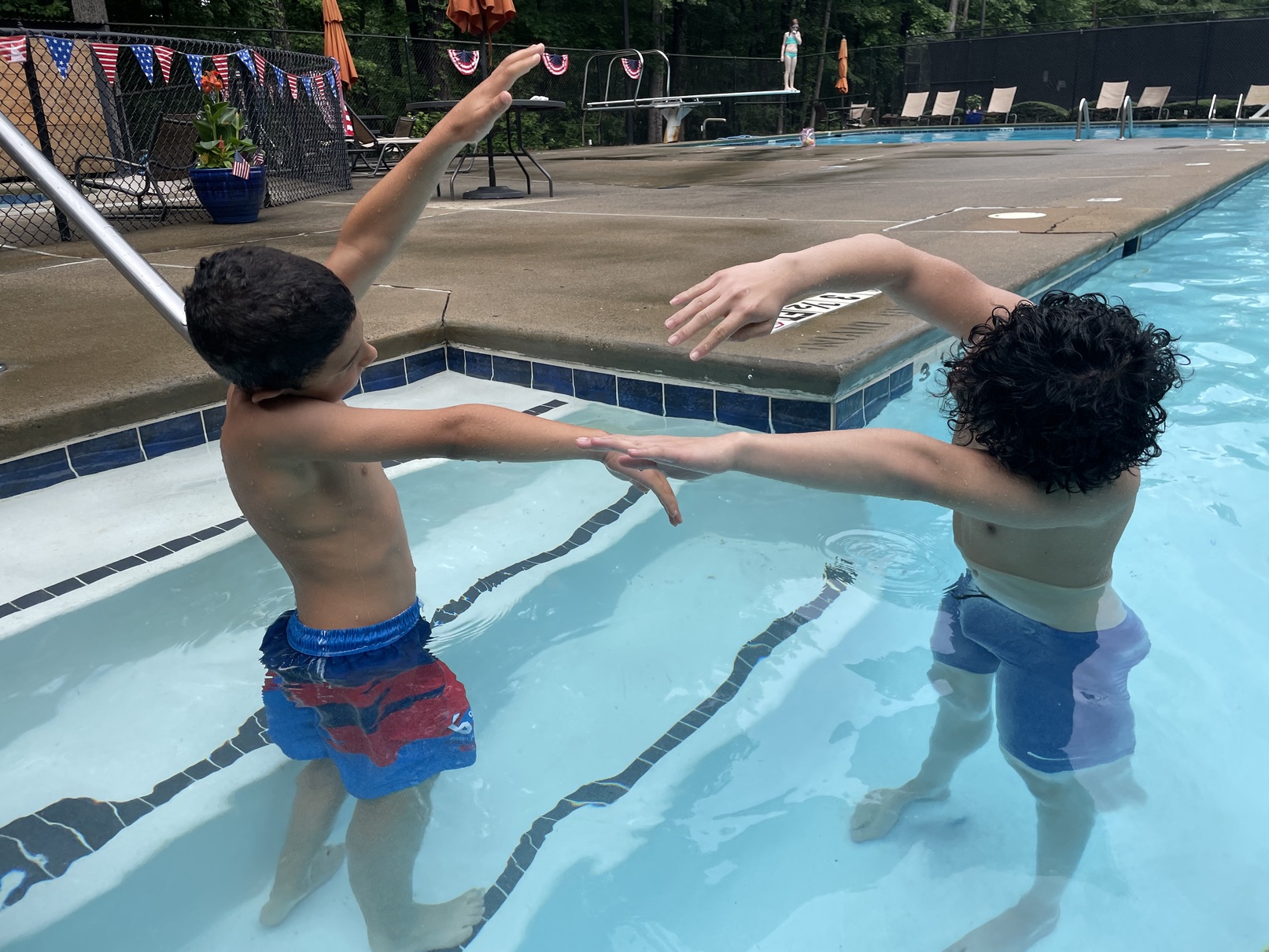 Kids having fun together in the pool